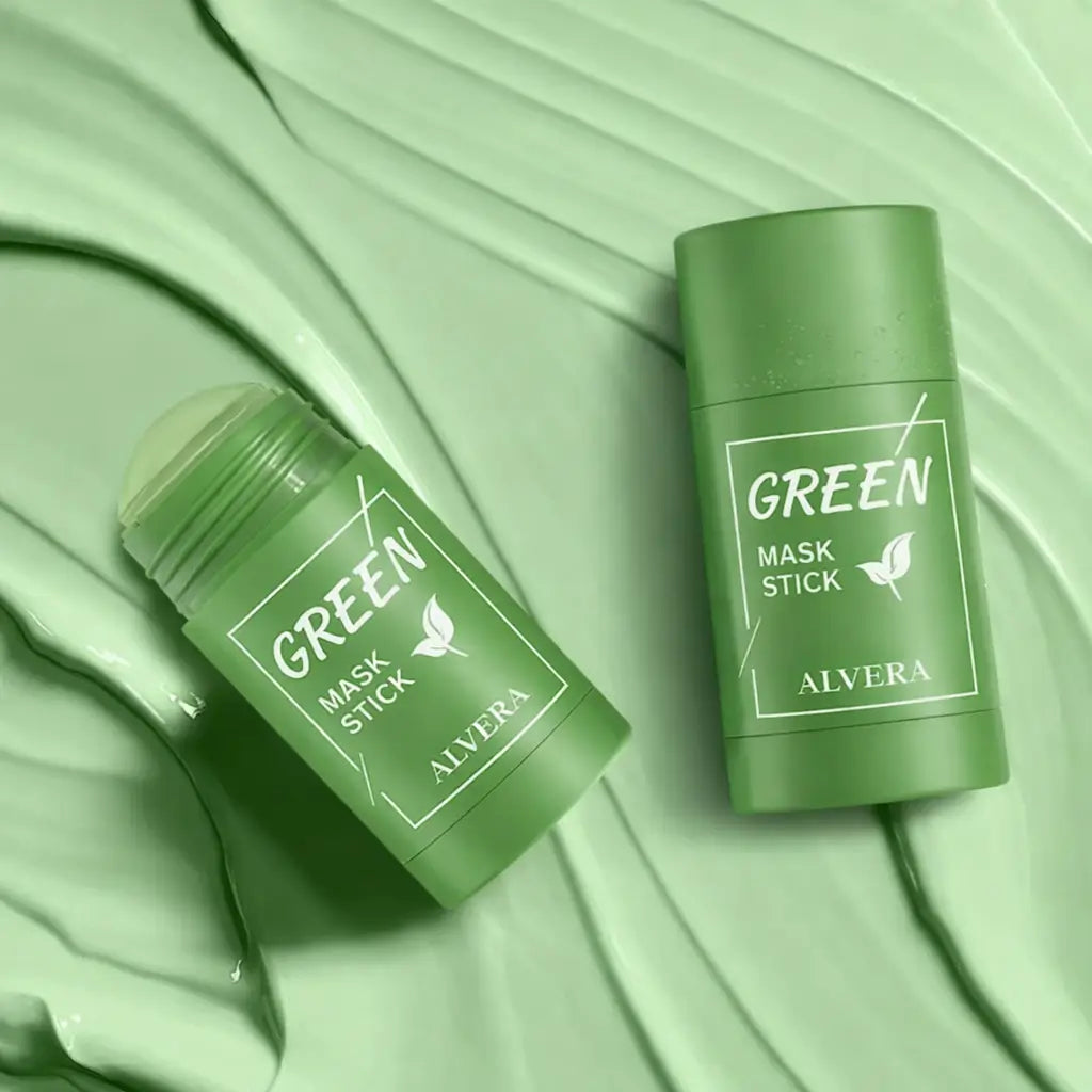 Two green mask sticks with 'ALVERA' branding on a green fabric background